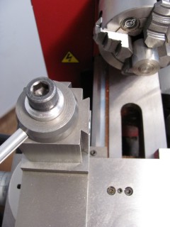 View of Mini Lathe carriage, cross slide, quick change toolpost and four jaw chuck from above